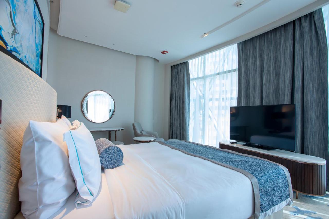 Century Marina Hotel - Lusail Exterior foto A bedroom at the hotel