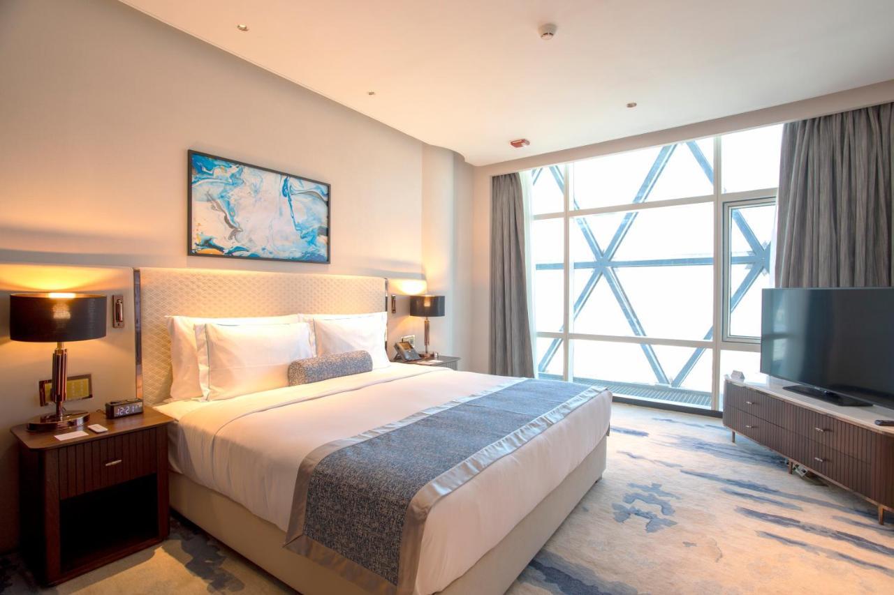 Century Marina Hotel - Lusail Exterior foto A bedroom at the hotel