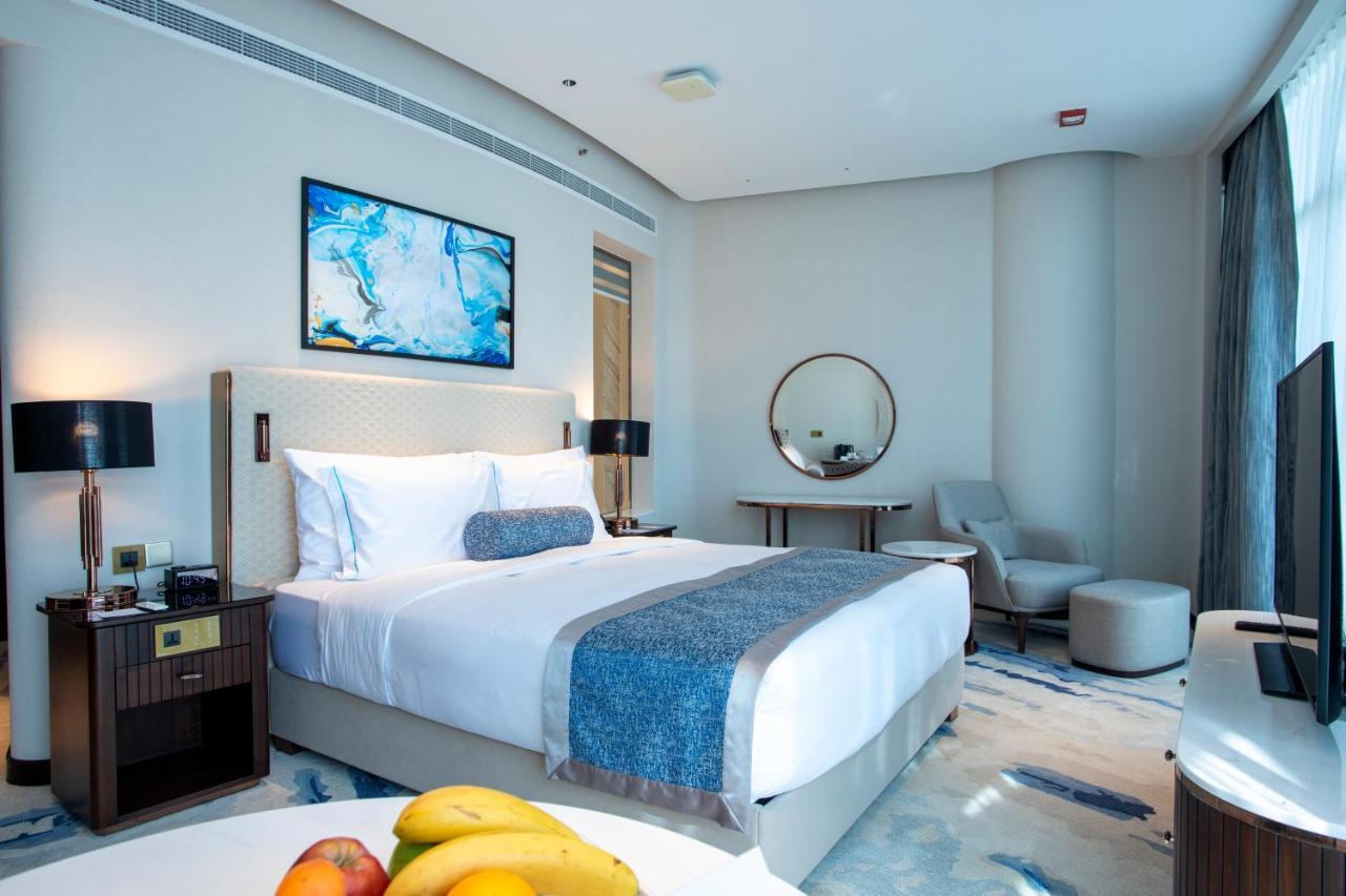 Century Marina Hotel - Lusail Exterior foto A bedroom at the hotel